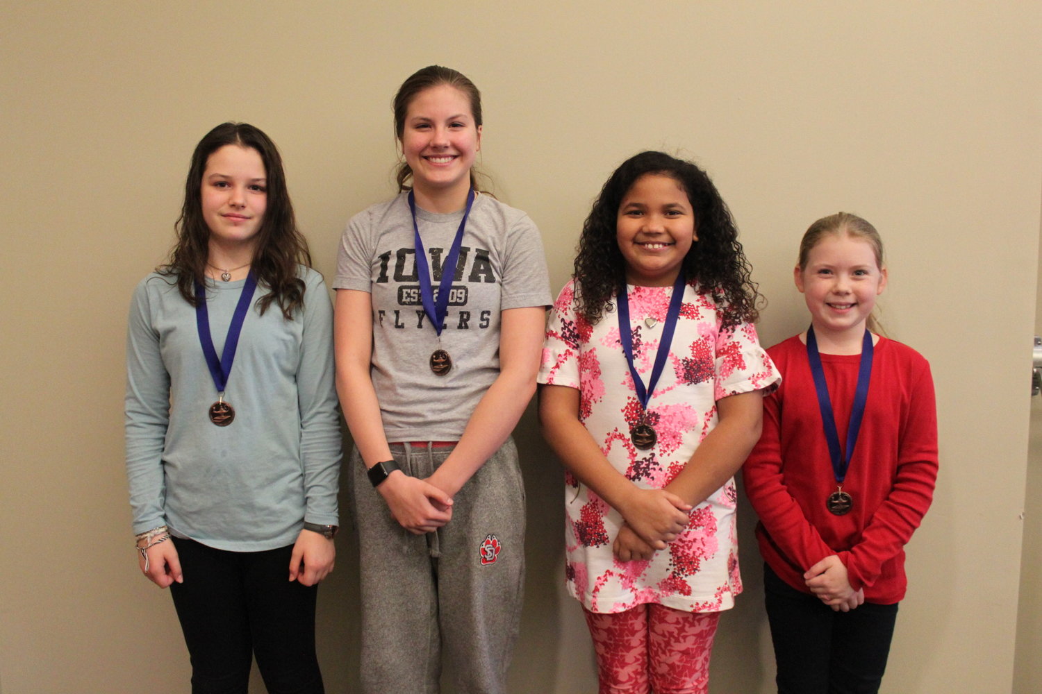 Third-place junior division team home-schoolers (from left) Ruby Brown, Isabella Friessen, Lyric Wright and Elizabeth Snyder.